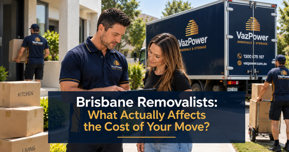 Brisbane removalist discussing moving costs with a customer outside a home while the Vaz Power moving team works in the background.
